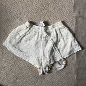 Glamours white crochet shorts